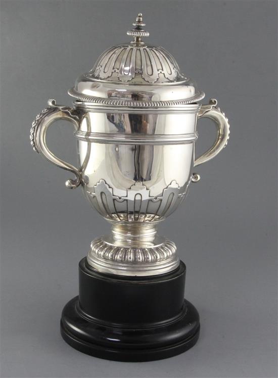 A George VI silver two handled trophy cup and cover by William Comyns & Sons Ltd, 78 oz.
